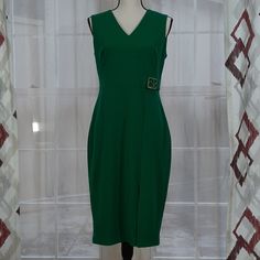 A Solid Coloway Sheath Dress With No Sleaves And Brand Logo Hardware Accent Is Refined, Elegant Must Have. -V-Neck -Sleeveless -Back Zip Closure -Solid Colorway -Brand Logo Hardware Accent -Approx., 39.75" 97% Polyester, 3% Spandex Mermaid Midi Dress, Mock Neck Sweater Dress, Flair Dress, Stripped Dress, Long Sleeve Knit Dress, Loose Fitting Dresses, Midi Cocktail Dress, Floral Lace Dress, Midi Sheath Dress