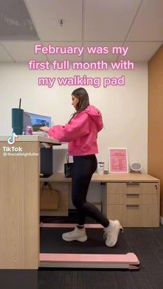 a woman is running on a treadmill in an office setting with the caption, february was my first full month with my walking pad