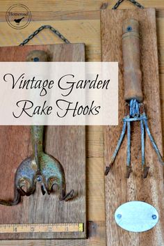 vintage garden rake hooks are displayed on wooden boards with chains hanging from them and the words, antique garden rake hooks