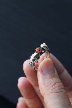 ITEM DESCRIPTION: The size of ring 7 1/4 (US and Canada) O1/2 (UK and AU) I can make it any size you want - just mark your size in the order Weight - 4 g. Please, contact me if you need Express shipping. There is a woodland ring of sterling silver and natural amber. I made it with cutest tiny mushrooms and fern leaf. Perfect unique jewelry for nature lovers! This Elven ring will be a great addition to your jewelry collection. You can order it with different gemstones - write to me and will discu Elven Ring, Witch Ring, Forest Ring, Witch Rings, Mushroom Ring, Elven Jewelry, Autumn Necklace, Earthy Jewelry, Amber Ring