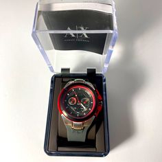 Armani Exchange Men’s Watch Medium Dark Gray W/ Red, Silver & Black Detailing In Perfect Condition {No Flaws} {Never Worn} Tag Was Cut Off But Otherwise It Is Brand New {Bnwot} I Am Always Open To Questions And Offers Be Sure To Check Out Similar Items In My Closet... Red Analog Watch For Formal Occasions, Formal Red Analog Watch, Classic Red Chronograph Watch With Round Dial, Classic Red Analog Watch, Formal Red Watch With Analog Display, Red Formal Watch Accessories With Analog Display, Formal Red Watch Accessories With Analog Display, Classic Red Chronograph Watch Accessories, Classic Red Chronograph Watch For Formal Occasions