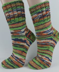 "Hand knitted thick  wool socks  Winter socks Knitted handmade socks  Striped mens or womens socks  Ready to ship I hand knit my socks in the round on 5 double pointed needles so there are no seams. The heel is made with a pattern. Length(toe to heel): 25 cm ( 9,84\")                                      Material: 6 ply sock yarn 25% Polyamide 75%Wool Hand wash,dry flat. Made in my smoke free home. See your local sizes in the chart,photo#4 The brightness and shade of the colors may be slightly different from what you see on your computer" Handmade Green Socks For Winter, Handmade Green Winter Socks, Casual Green Knitted Socks, Comfortable Handmade Green Socks, Casual Handmade Green Socks, Thick Wool Socks, Womens Socks, Handmade Socks, Knitted Socks