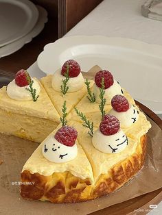 a piece of cake with raspberries on top