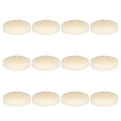 eight candles are arranged in rows on a white background