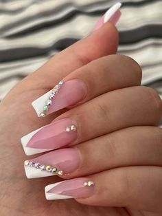 White Nails With Designs Diamonds, White Nail Short Design, White V French Tip Nails With Design, White French Tip Nails With Accent Nail, French Tip Nails Variation, Fancy French Tip Nails Coffin, French Tip Nails With Jewels Rhinestones, Nail Ideas French Tip With Gems, French Acrylic Nails With Gems