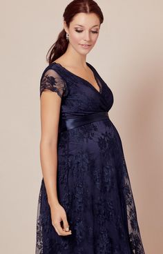 Sumptuously rich new Arabian Nights is the latest colourway for our best-selling Eden short maternity gown. Such a striking yet simple colour to accessorise, it’s perfect for your busy festive social calendar. For your supreme comfort, we chose our signature stretch lace, with an intricate floral pattern over soft-sheen tonal lining for swish without cling. Delicate cap sleeves are unlined so soft edged floral lace takes centre stage, highlighting the delicate scalloped edge in the deep crossove Elegant Maternity Dress For Party, Elegant Party Maternity Dress, Elegant Maternity Party Dress, Elegant V-neck Maternity Dress For Evening, Rose Tiffany, Maternity Wedding Dresses, Maternity Wedding, Tiffany Rose, Pregnant Wedding