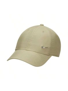 the hat is tan and has a small white bird on it's back side