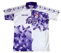 a soccer jersey that is purple and white with the name teka printed on it