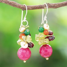 The colors on Nareerat's bright dangle earrings are reminiscent of cheerful winter festivities. The Thai artisan uses shimmering silk thread to hand knot clusters of peridot chips chalcedony and garnet beads green quartz and peach-dyed cultured pearls. A faceted quartz globe dangles from the gemstone cluster while sterling silver hooks finish the colorful pair. Multicolor Gemstone Long Drop Earrings, Multicolor Dangle Faceted Beads, Dangle Peridot Gemstone Earrings, Thailand Gifts, Bohemian Multi-stone Dangle Earrings, Multicolor Multi-stone Dangle Earrings, Green Quartz, Nature Inspired Jewelry, Elegant Necklaces