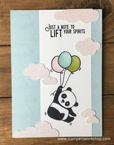 a card with a panda holding balloons and saying, just a note to lift your spirits