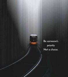 a train traveling through a tunnel with the words be someone's priority not a choice