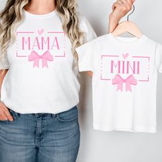 Get ready to elevate your mommy-and-me style with these adorable matching jersey short sleeve tees! 🌸 Made from 100% Airlume combed and ringspun cotton, these tees offer ultimate comfort for both mom and daughter. It's like wearing a warm hug from each other all day long! ✨ The quality print on each tee adds a touch of charm to your twinning attire. With ribbed knit collars, these tees offer a perfect fit for both of you while maintaining their shape over countless washes and wears. 👚 Crafted Matching Short Sleeve T-shirt For Birthday, Pink Short Sleeve T-shirt For Family, Pink Short Sleeve Tops For Family, Cute Short Sleeve Tops For Mother's Day, Cute White T-shirt For Mother's Day, Pink Matching Tops For Mother's Day, Cute Name Print Shirt For Mother's Day, Mother's Day Family Matching Tops With Letter Print, Cute Mother's Day Shirt With Name Print