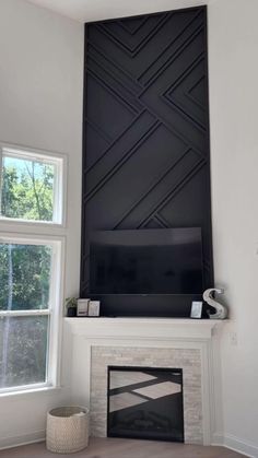 a fireplace with a flat screen tv above it