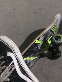 a skateboarder's feet with their shoes on