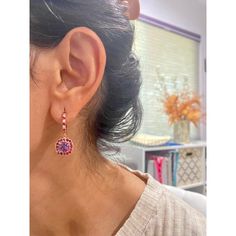 These cute and dainty Earrings have 2 Cushion Cut Amethysts that weigh 2.27 Carats and are embellished with 46 Round Cut Red and White Sapphires that weigh 1.56 Carats. The Total Carat weight of the Earrings are 3.83 Carats. The Earrings are about an 1.2 inches in length They are beautifully set in 14 Karat Rose Gold and weigh approximately 4.9 Grams.   Exact dimensions for this item are unknown. Please reach out in the seller Q&A for any questions on measurements. Elegant Rose Gold Multi-stone Earrings, Purple Jeweled Earrings As Gift, Purple Jeweled Earrings For Gift, Pink Multi-stone Earrings In Fine Jewelry Style, Pink Multi-stone Earrings Fine Jewelry, Pink Multi-stone Earrings For Anniversary, Pink Multi-stone Round Earrings, Pink Multi-stone Earrings For Gift, Purple Multi-stone Earrings For Anniversary