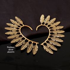 Brass Feathers ear cuff Metal:- Brass Shipping:- All the parcels will be shipped within 3 days of purchase. Delivery:- Delivery will take time 2-3 weeks sometimes longer. SPEED POST take 7 - 10 days. Contact for fast shipping upgrades. Return:- I want all my customers to be happy with their purchases.if you are not satisfied with our product, you may return your order within 7 days from the date of shipment received. The item must be returned in unwashed, Unworn, unaltered With The Original Cond Gold Fantasy Jewelry For Festivals, Gold Bohemian Ear Cuff For Party, Metal Ear Cuff For Festivals, Bohemian Pierced Ear Cuff For Party, Bohemian Style Pierced Ear Cuff For Party, Adjustable Gold Ear Cuff For Festivals, Bohemian Gold Metal Ear Cuff, Gold Bohemian Metal Ear Cuff, Gold Metal Ear Cuff For Festival