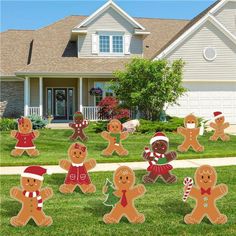 gingerbread cutouts in front of a house