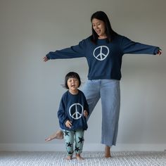 This sweatshirt will match perfectly with our kids version! Available in two sizes S/M and M/L. - 100% Cotton- 100% Mommy and Me!! *All models are wearing size SM. *it may shrink a bit in the first wash, size up if you are in between sizes or you like the oversize look Unisex Long Sleeve Loungewear Tops, Unisex Long Sleeve Tops For Loungewear, Unisex Long Sleeve Lounge Tops, Unisex Casual Long Sleeve Tops, Blue French Terry Sweats For Loungewear, Playful Blue Sweatshirt For Fall, Playful Crew Neck Tops With Ribbed Cuffs, Blue Playful Fall Sweatshirt, Blue Sweater With Graphic Print For Loungewear