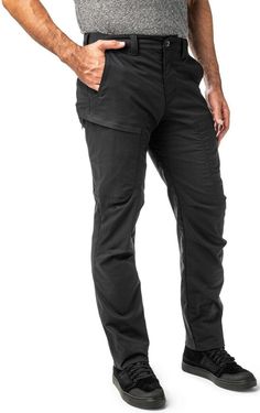 The 5.11 Tactical Ridge Pants were designed with all the functionality of traditional tactical pants, while maintaining a covert look that doesn't scream tactical. Built with SERE functionality in mind, the Ridge Pants have a hidden handcuff key pocket, an IWB flex cuff tunnel, and hidden pockets. These pants offer high range of motion and are suited for duty work as well as every day carry. Features: Body: 77% polyester/33% cotton Flex-Tac canvas, 6.4-oz. Contrast: 87% polyester/13% elastane plain weave, 4.7-oz., DWR finish Pocketing: 80% polyester/20% cotton poplin, 4.0-oz. Comfort waistband with zipper and logo button closure Flex cuff tunnel inside waistband Reinforced belt loops with center back webbing loop Angled hand pocket openings with N6 knife reinforcement Back yoke utility poc Durable Tactical Cargo Pants For Outdoor Activities, Tactical Pants With Functional Pockets For Outdoor Activities, Tactical Pants For Outdoor Activities With Functional Pockets, Durable Tactical Cargo Pants For Hiking, Black Tactical Bottoms For Outdoor Work, Tactical Cargo Pants For Hiking, Tactical Hiking Bottoms With Functional Pockets, Black Cargo Pants With Hip Pockets For Outdoor Work, Tactical Hiking Pants With Functional Pockets