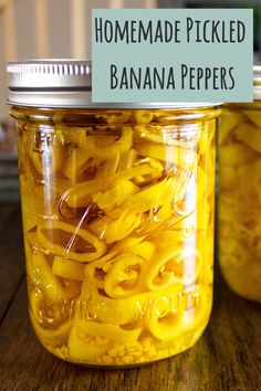 homemade pickled banana peppers in a jar on a wooden table with text overlay