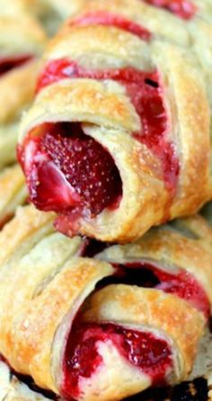 strawberry cream filled pastries stacked on top of each other