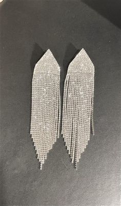 "Sparkling 6 \" Extra Long Wide Clear Tassel Rhinestone Drop Earrings, Silver ,  Weddings , Statement Earrings  DAZZLING AND SPARKLY !!     6 \" Long x almost 1 1/2\" Wide \" ! Beautiful and Stunning Earrings    Please ask any questions as I do not accept returns! Thank You" Silver Weddings, Drop Earrings Silver, Earrings Chandelier, Earring Silver, Stunning Earrings, Earrings Silver, Chandelier Earrings, Extra Long, Statement Earrings