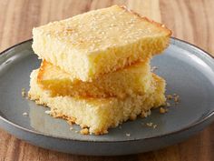 two pieces of cake sitting on top of a blue plate