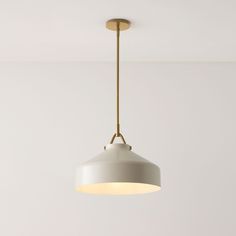 a white light hanging from the ceiling in a room with no one on it or someone else