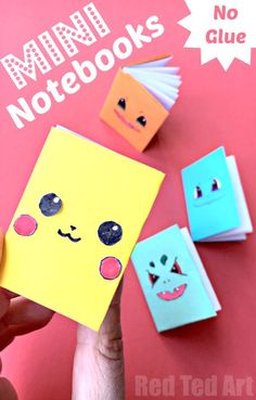 someone is holding up some cute little notebooks with their faces on them and the words, mini notebooks no glue