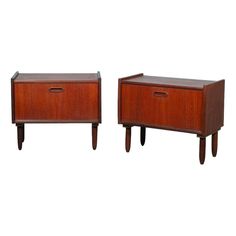 Chic set of two identical vintage bedside tables from the sixties, made entirely of wood. These cabinets have a stylish and organic design that fits beautifully in both retro and modern interiors. Both cabinets have subtle wooden handles with which the doors open like flaps, supported by the original flap fittings. The cabinets stand on four tapered legs, which gives them a light appearance and keeps the space nice and open. These bedside tables have been professionally renovated by us and finis Minimalist Bedside Tables, Green Nightstands, Minimalist Bedside Table, Bedside Table Set, Vintage Bedside Table, Lane Furniture, Tables Set, Nightstand Storage, The Sixties