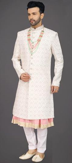 White and Off White color Sherwani in Silk fabric with Embroidered, Sequence, Thread work White Kurta With Cutdana For Reception, White Cutdana Kurta For Reception, Designer White Sherwani With Cutdana, Designer White Bandhgala With Cutdana, White Bandhgala With Cutdana For Wedding, White Cutdana Bandhgala For Wedding, White Wedding Bandhgala With Cutdana, Designer White Sets With Cutdana, Formal White Sherwani With Dupatta