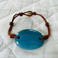 Brown Leather Rope; Freshwater Pearl Closure; Smooth, Shiny Ombre Blue Oval Piece. Perfect Condition. The Lines In The Blue Piece Are Inherent To The Piece. Purchased From The Vintage Selection At The East Hampton, New York Store. 7" Length Hampton New York, Ralph Lauren Jewelry, Ralph Lauren Leather, Lauren Brown, Vintage Ralph Lauren, East Hampton, Blue Ombre, The East, Womens Jewelry Bracelets