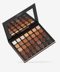 A 35-shade eyeshadow palette. Meet the matte must-have your makeup collection has been missing, the BPerfect Ultimattes - 35 Pan Shadow Palette! In this palette you’ll find 35 powerfully pigmented white, cream, brown, orange, and black-hued eyeshadow shades that suit every skin tone and offer effortless blendability. With a collection of buttery mattes in warm and neutral tones, this eyeshadow palette is an essential for creating striking eyeshadow looks that stun. - Vegan - Cruelty-free Brown Eye Makeup Palette, Eyeshadow Makeup Palette, Brown Eye Palette, Brown Makeup Palette, Best Makeup Pallets, Best Eyeshadow Palette For Brown Eyes, Makeup Products Eyeshadow Palette, Dark Eyeshadow Palette, Affordable Eyeshadow Palettes