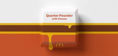 a mcdonald's quarter pounder with cheese on it is hanging from the wall