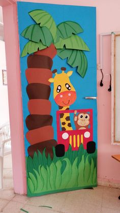 a door decorated with a giraffe and monkey