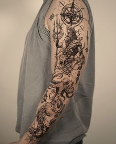 a man with a tattoo on his arm