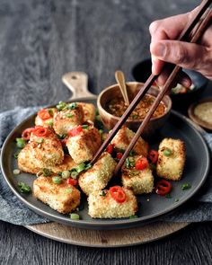 korean fried crispy crunchy air fryer panko tofu on a plate with chopsticks