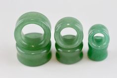 three jadeite rings sitting on top of each other