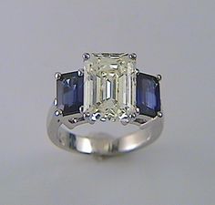 Emerald Cut Diamond Engagement Ring with Ceylon Blue Emerald Cut side stones | K & W Jewelry - Kestenbaum & Weisner Bijoux Art Deco, Emerald Cut Diamond Engagement Ring, Emerald Cut Diamond Engagement, Blue Emerald, Emerald Cut Diamond, Sapphire Engagement Ring, Jewellery Ideas, Bling Rings, Emerald Cut Diamonds