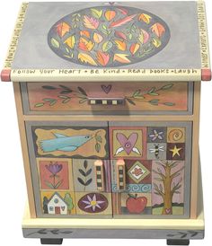 a wooden box with many different designs on it