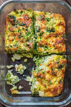 broccoli and cheese casserole in a glass dish on a wooden table