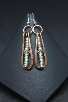 Copper and Silver mixed earrings | Etsy Copper Teardrop Beaded Earrings, Copper Beaded Teardrop Earrings, Beaded Copper Teardrop Earrings, Bronze Metal Teardrop Earrings, Copper Beaded Teardrop Jewelry, Copper Teardrop Beaded Jewelry, Teardrop Silver Beads Metal Jewelry, Beaded Copper Teardrop Jewelry, Nickel-free Copper Teardrop Beaded Earrings