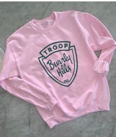 Soft cozy sweatshirt. Unisex fit. Cotton and polyester blend Printed in USA Also available in a T shirt and green sweatshirt. Youth T shirts as well! Beverly Hills Movie, Feminine Esthetics, Troop Beverly Hills, Patches Shirt, Polyester Shirt, Green Sweatshirt, Movie Shirts, Awareness Shirt, Cozy Sweatshirts