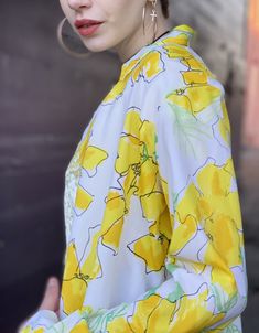 "Bright as sunshine yellow floral Vera button down blouse. All nylon ⭐️ Marked a size 14 In excellent condition with no flaws of note. Measurements Bust 40\" Length 25\" Please message me with questions before purchasing. All sales are final and ship fast from the Vermont shop. Find us on Instagram @anasclosetfullofcolor Thankyou XO" Yellow Printed Blouse For Summer, Retro Printed Spring Blouse, Retro Printed Blouse For Spring, Yellow Printed Blouse For Day Out, Summer Daywear Yellow Blouse, Yellow Printed Collared Blouse, Yellow Summer Blouse For Daywear, Summer Yellow Blouse For Daywear, Retro Yellow Blouse For Spring