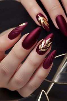 Dark Red With Gold Nails, Burgundy Gold Nail Designs, Burgundy Autumn Nails, Red Gold Nail Art, Burgundy Almond Nails Design, Gold Autumn Nails, Red Gold Nails Design, Wine Color Nails Designs, Burgundy And Gold Nail Designs