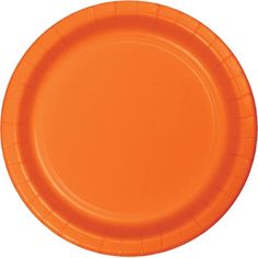 an orange paper plate on a white background