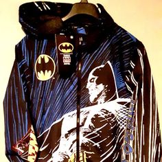 New Men's Retro Design Batman Jacket With Hood Sz. Xl. This Gem Has Classic Logo's Here And There, And Features Batman In Action In Front. Full Zip-Down With Split Front Pockets. Tango Hotel Graces One Sleeve, While The Bat Graces The Other. This Item Ships In 1-3 Business Days, And The Listing Price Is Negotiable. Pop Culture Long Sleeve Outerwear For Streetwear, Winter Hooded Windbreaker With Graphic Print, Hooded Winter Outerwear With Character Print, Winter Hooded Outerwear With Character Print, Hooded Character Print Fall Outerwear, Winter Character Print Outerwear For Streetwear, Streetwear Long Sleeve Outerwear With Character Print, Streetwear Outerwear With Character Print, Long-sleeve Character Print Streetwear Outerwear