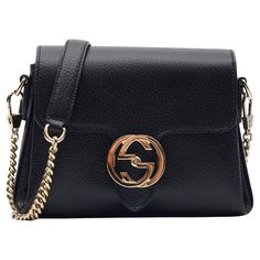 This crossbody bag is made of grained calfskin leather in black. The bag features light gold tone hardware, a matching chain link shoulder strap and a top crossover flap closure. The top crossover flap is secured with an interlocking GG flip lock hardware at the front and opens to a partitioned beige fabric interior with a patch pocket. Outlet. Color: Black with polished light gold hardware (looks silver in light) Material: Grained pebbled calfskin Model No. 607720 Made in Italy Measurements~ He Gucci Messenger Bag Lyst, Gucci Dollar Calfskin Interlocking, Gucci Brand, Cartier Panthere, Bracelet Love, Crossbody Bag Black, Beige Fabric, Feature Light, Black Cross Body Bag