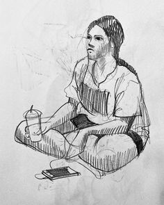 a black and white drawing of a woman sitting on the floor holding a coffee cup