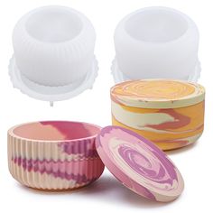 three different types of cake pans on a white background, one is pink and the other is yellow